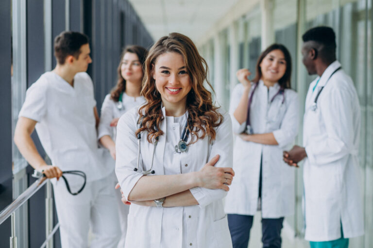 young female doctor posing corridor hospital 1536x1024 1 768x512